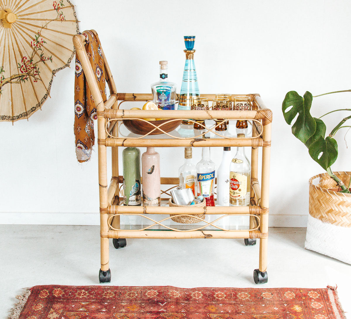 vintage boho cane bamboo bar liquor trolley with wheels and glass shelves