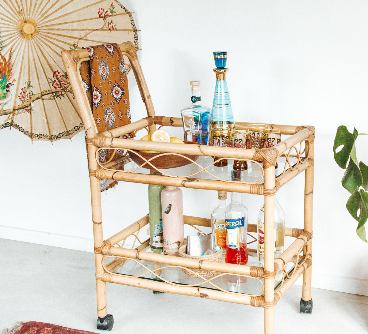 vintage boho cane bamboo bar liquor trolley with wheels and glass shelves