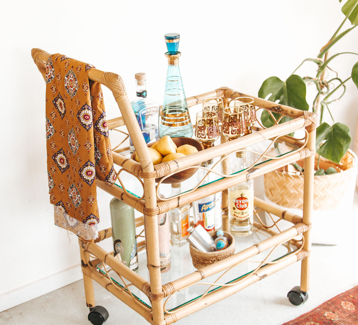 vintage boho cane bamboo bar liquor trolley with wheels and glass shelves