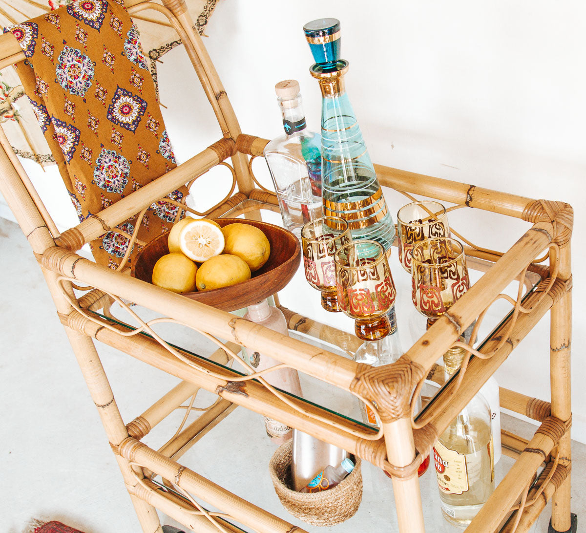 vintage boho cane bamboo bar liquor trolley with wheels and glass shelves