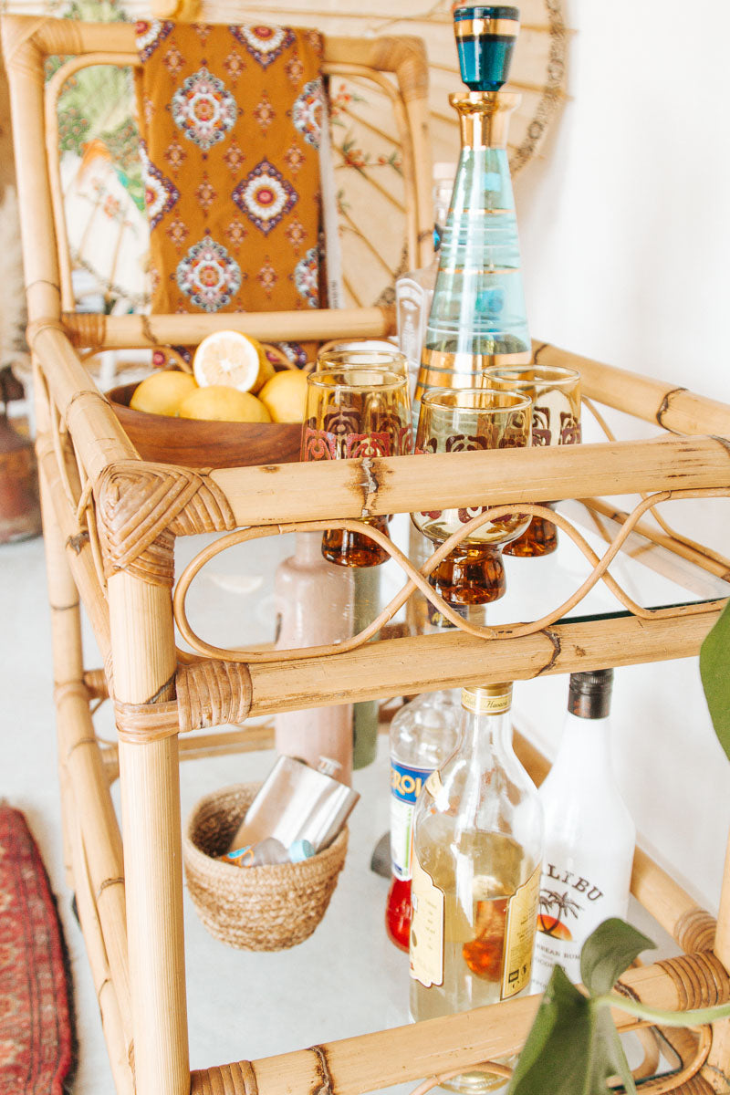 vintage boho cane bamboo bar liquor trolley with wheels and glass shelves