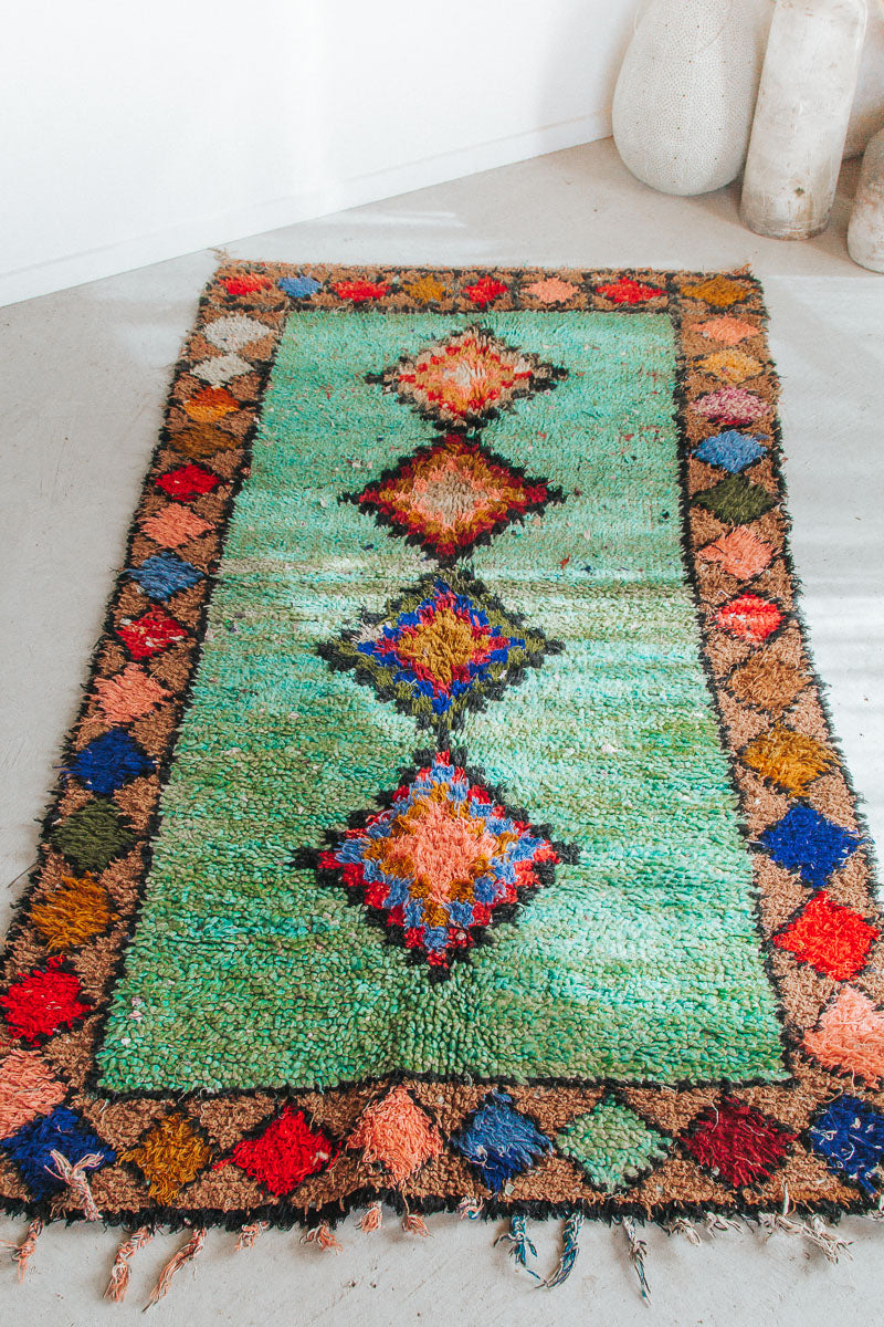 vintage moroocan rug, azilal boujaad wool rug for bathroom in green tones and earth tones