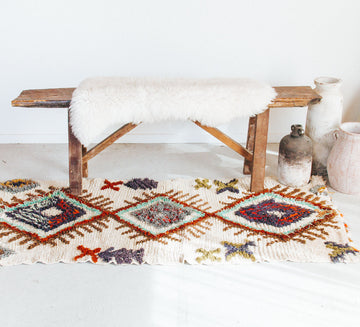 vintage moroocan rug, azilal boujaad wool rug for bathroom in peach tones and earth tones