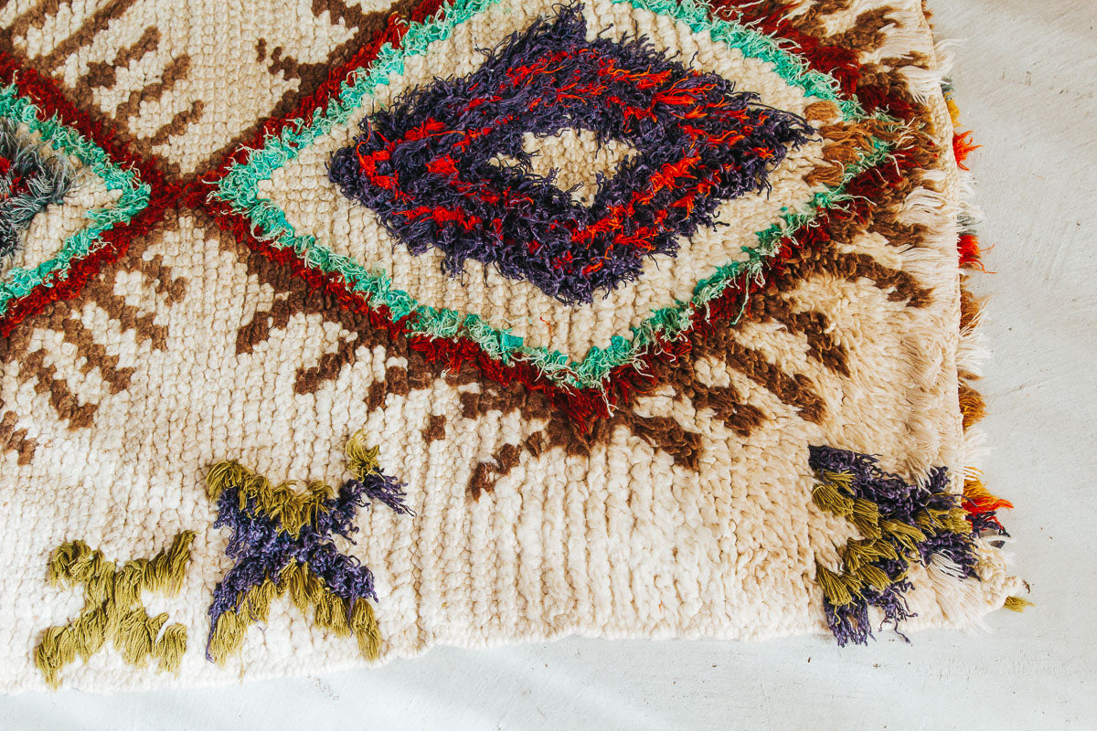vintage moroocan rug, azilal boujaad wool rug for bathroom in peach tones and earth tones