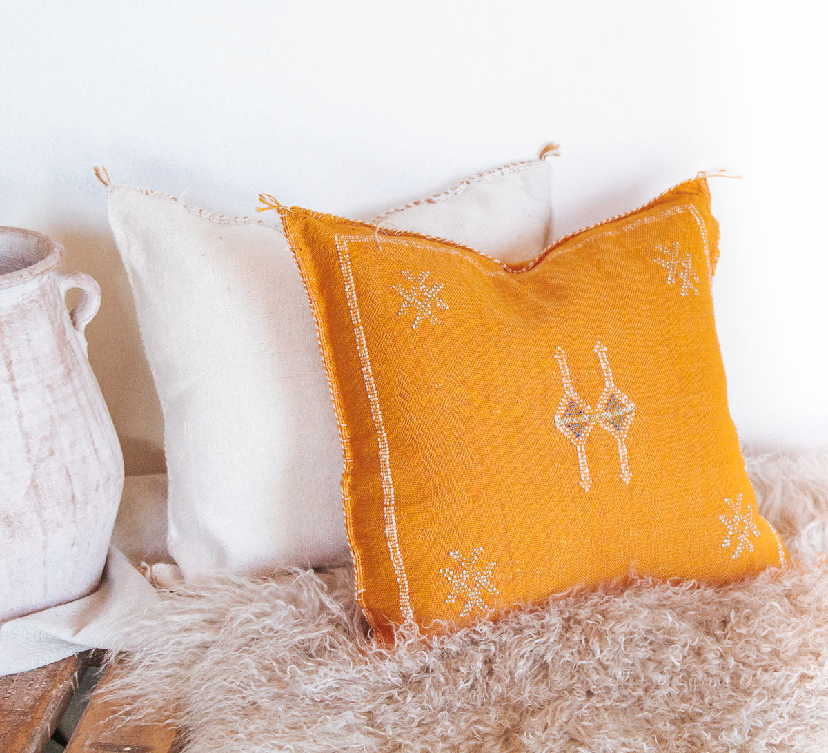 boho moroccan cactus silk embroidered cushion in turmeric orange yellow