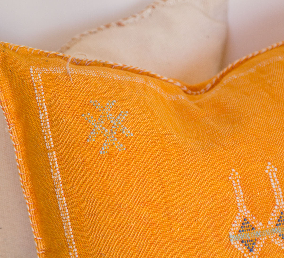 boho moroccan cactus silk embroidered cushion in turmeric orange yellow