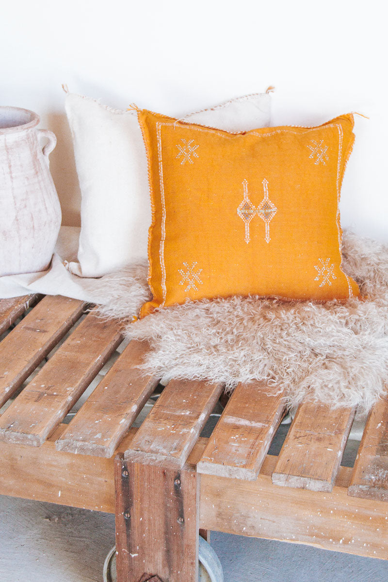 boho moroccan cactus silk embroidered cushion in turmeric orange yellow