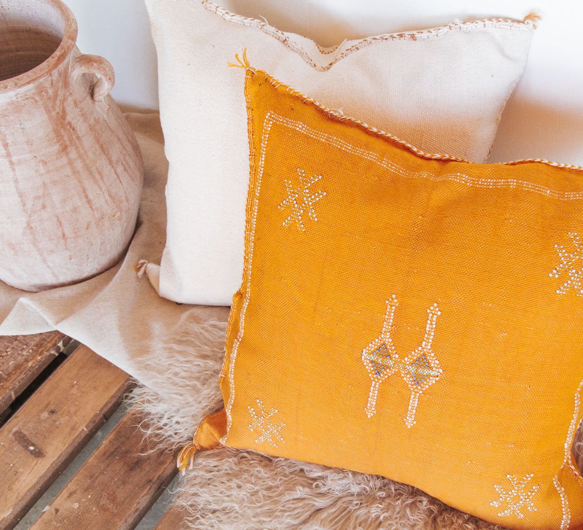 boho moroccan cactus silk embroidered cushion in turmeric orange yellow