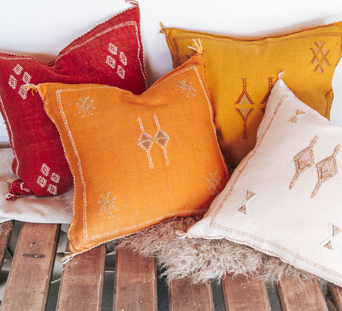 boho moroccan cactus silk embroidered cushion in turmeric orange yellow