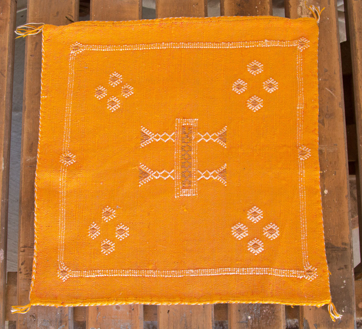 boho moroccan cactus silk embroidered cushion in turmeric orange yellow