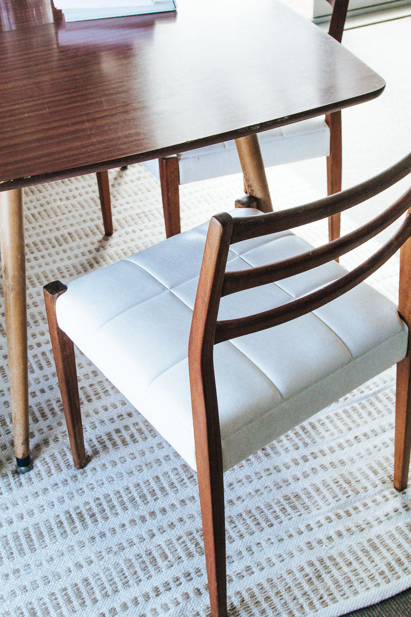 vintage mid century modern mahogany dining chairs with white textured vinyl seat