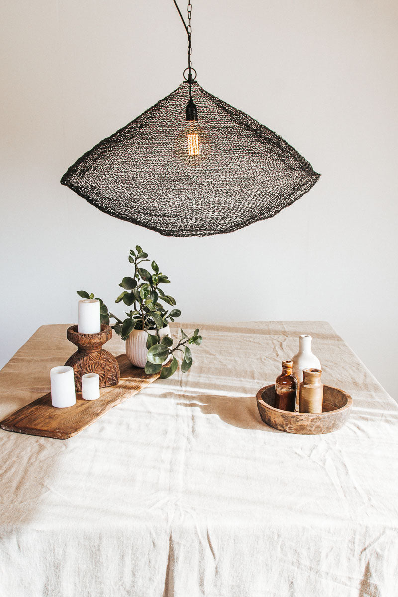 black wire mesh pendant light made from metal links in boho scandi style