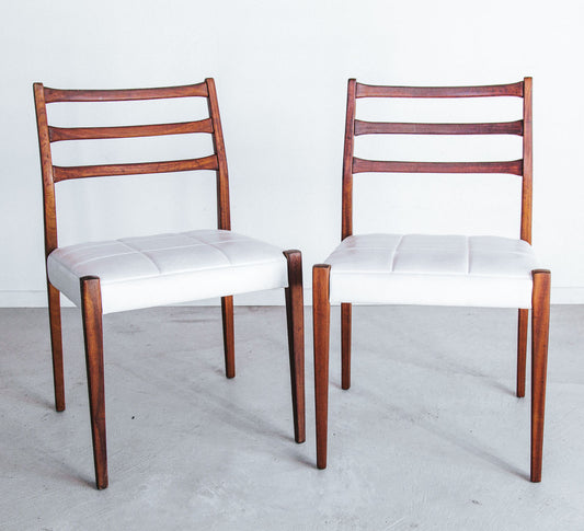 vintage mid century modern mahogany dining chairs with white textured vinyl seat