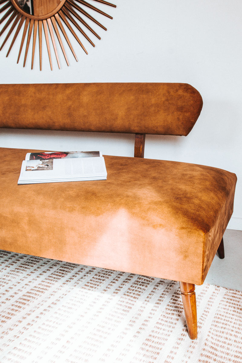 vintage boho mid century modern sofa with oak back and wooden legs.  upholstered in suede-like buttery soft mustard gold velvet couch