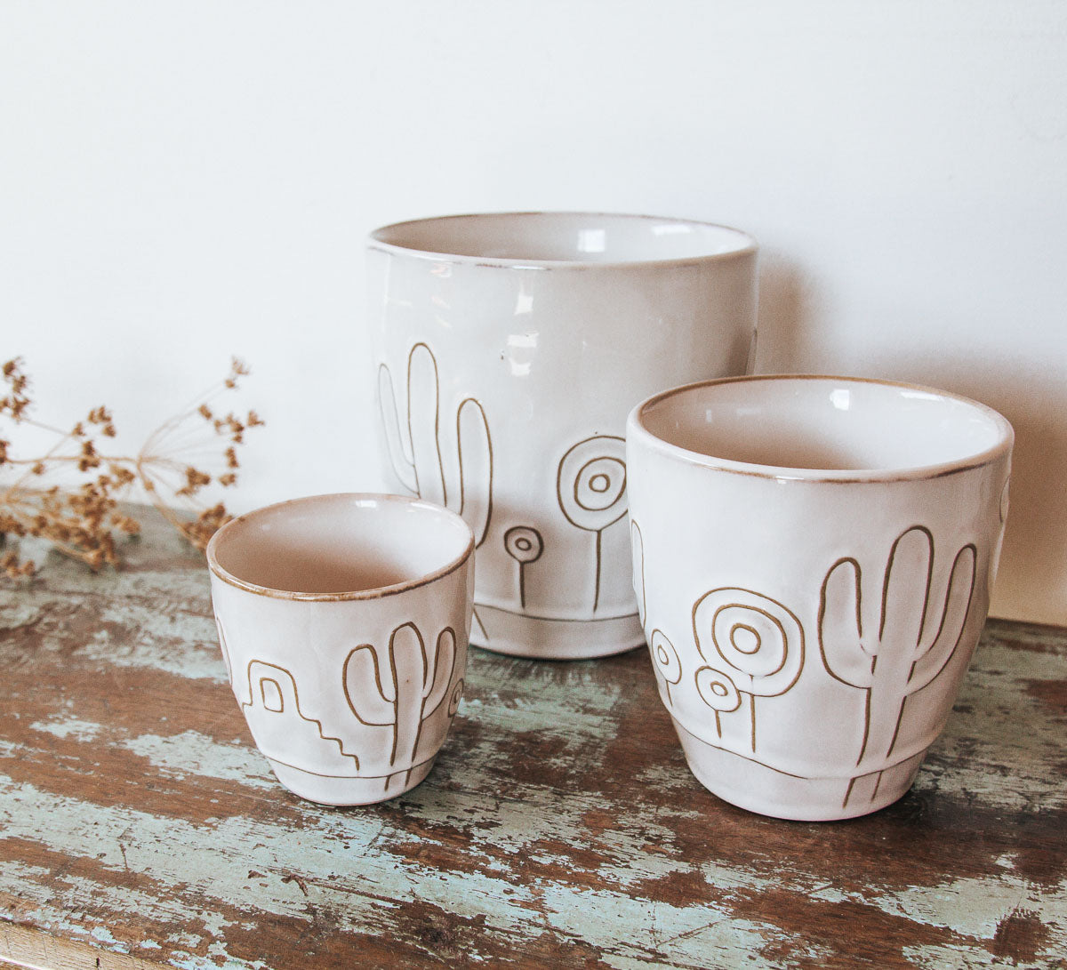 boho stoneware planters with cactus imprint by madam stoltz