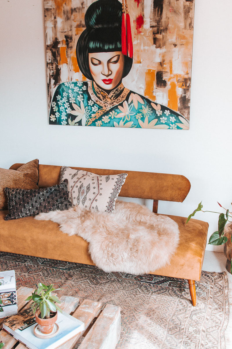 vintage boho mid century modern sofa with oak back and wooden legs.  upholstered in suede-like buttery soft mustard gold velvet couch