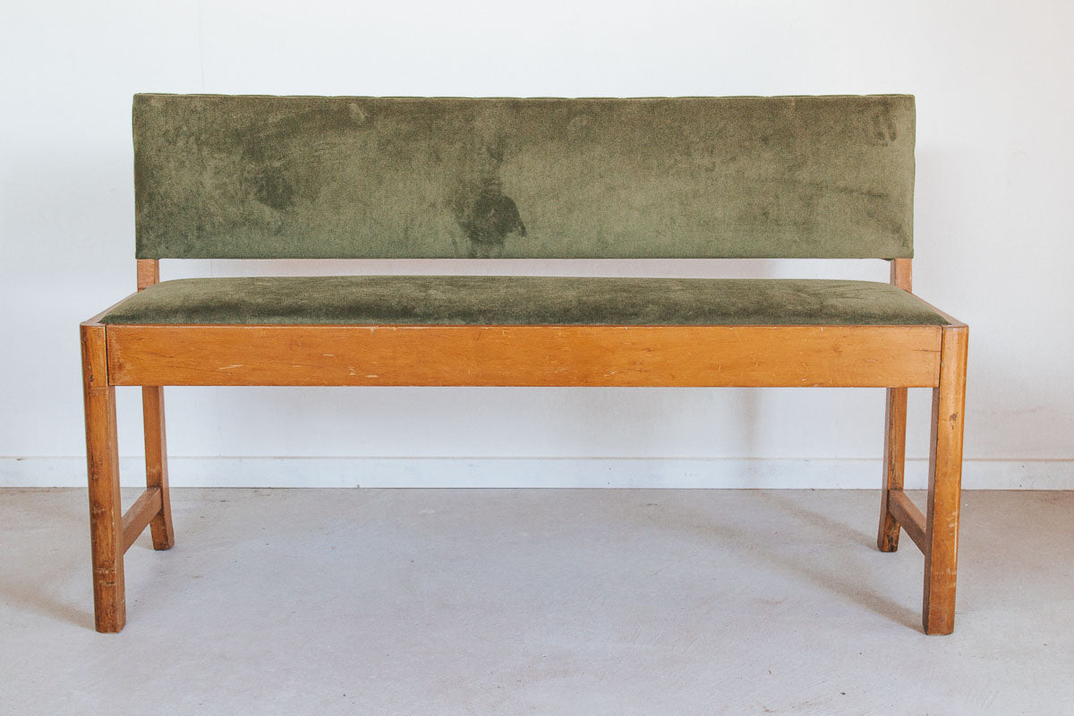 vintage retro boho wooden bench seat with back, covered in olive green velvet