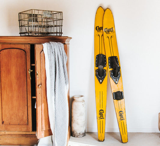 bright yellow vintage boho wooden antique water skis made by fred williams