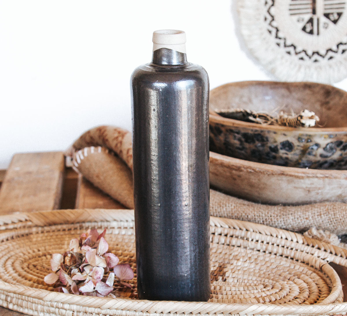 vintage boho black stone crock wine bottle