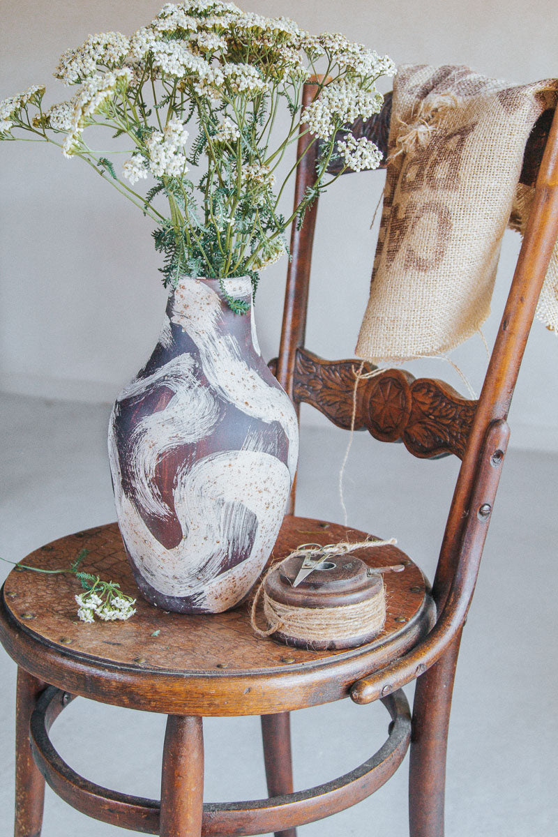 designer interior stylist ceramic boho vase with bornw and cream swirls studio pottery
