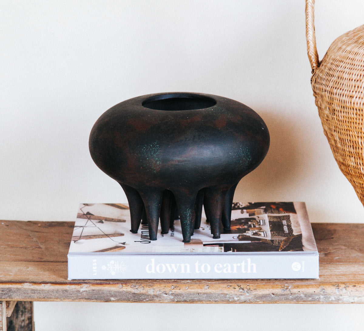 boho sculptural gallery style matt black tribal style vase vessel with sculptural legs