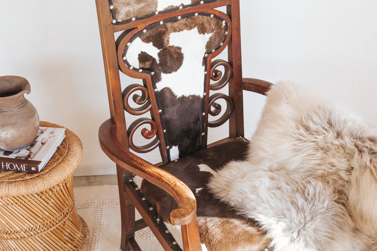 boho interior designer furniture chair with cowhide upholstery