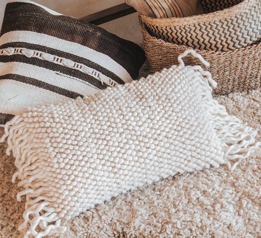 deisgner boho wool bobble and tassle breakfast cushion pillow