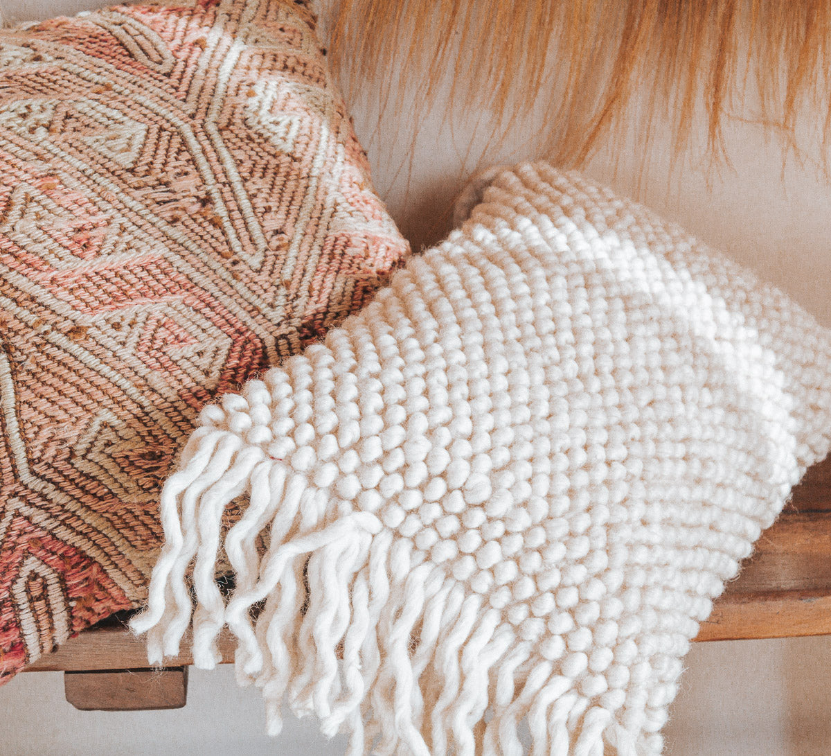 deisgner boho wool bobble and tassle breakfast cushion pillow