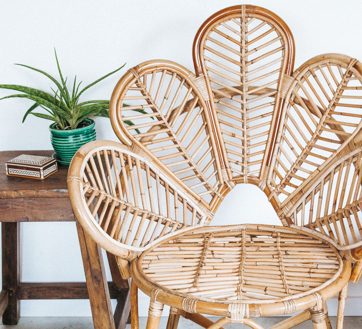 natural boho cane rattan petal shaped lounge or bedroom chair with curved back