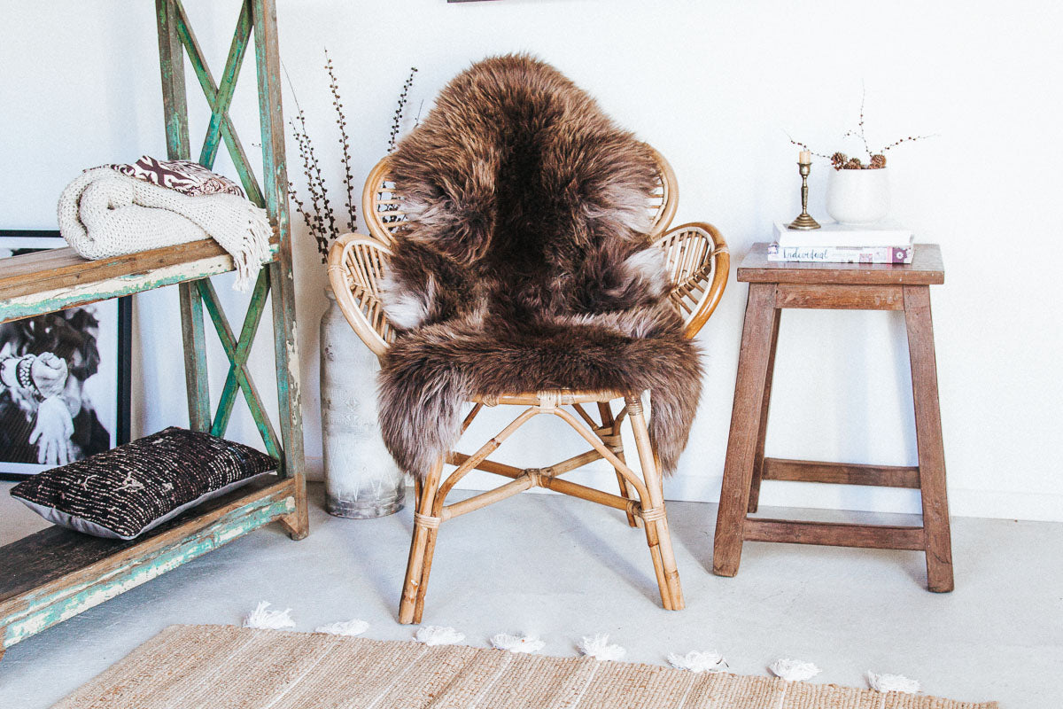 natural boho cane rattan petal shaped lounge or bedroom chair with curved back