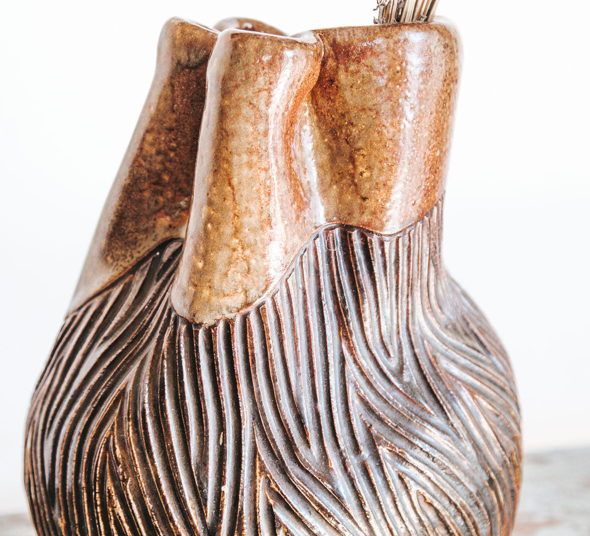 vintage boho rustic textured pottery vase in warm earthy tones