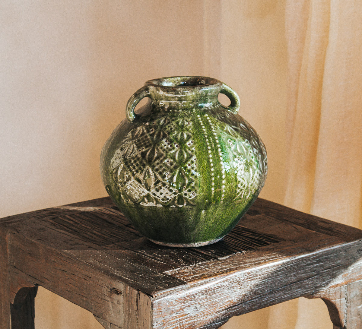 siracusa earthy textured boho designer style urn in an olive green glaze