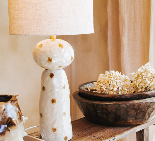 designer boho inerior design ceramic statement lamp with textured glazed and spotted caramel dots