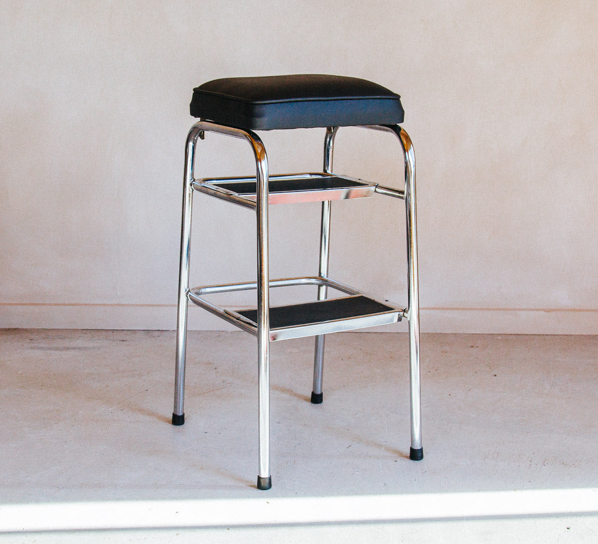 vintage retro chrome step stool with black vinyl seat