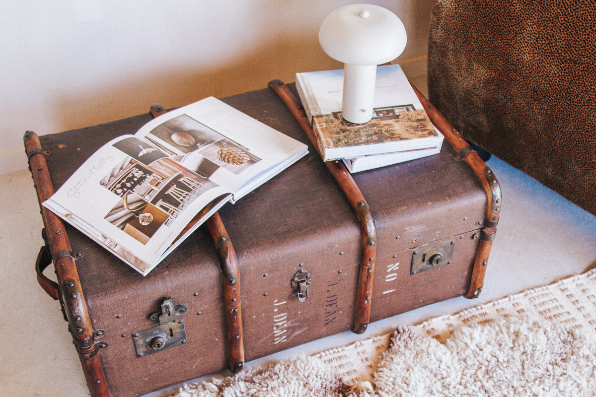 vintage boho antique canvas travel trunk with wooden runners and brass metal corners