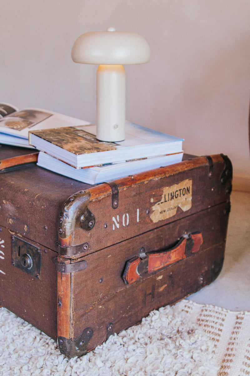 vintage boho antique canvas travel trunk with wooden runners and brass metal corners