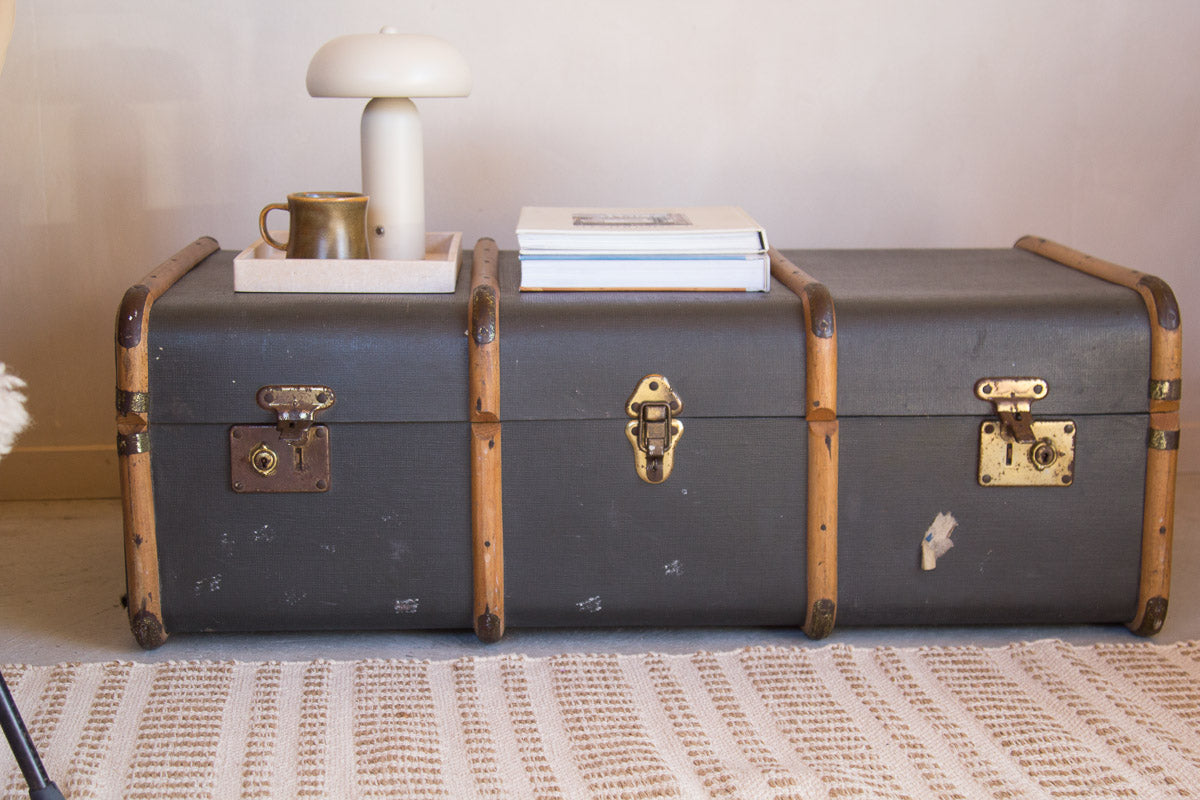 vintage boho antique canvas travel trunk with wooden runners and brass metal corners