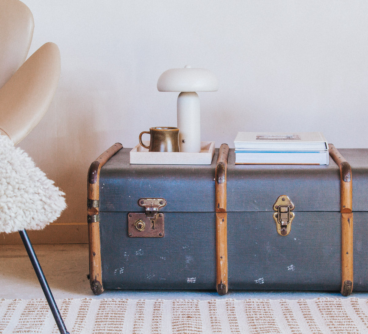 vintage boho antique canvas travel trunk with wooden runners and brass metal corners