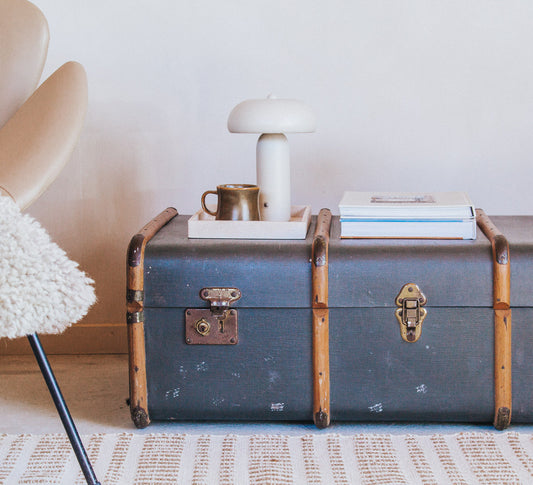 vintage boho antique canvas travel trunk with wooden runners and brass metal corners