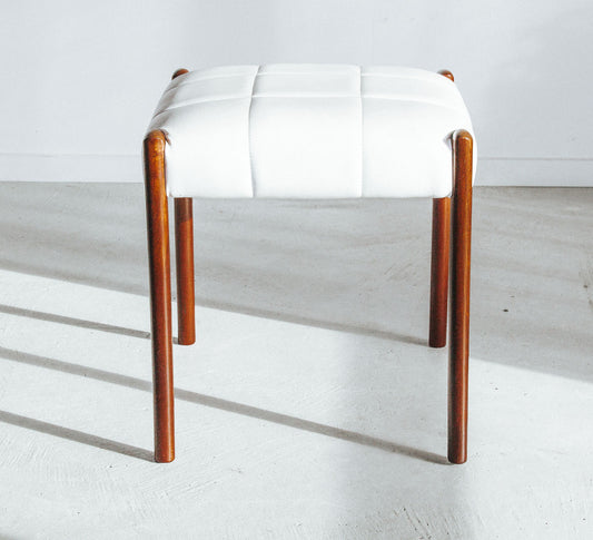 vintage mid century modern retro stool made from mahogany with a white vinyl seat and soft curved legs