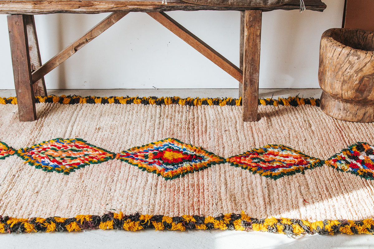 vintage boho wool woollen moroccan boujaad hallway runner rug in terracotta peach tones with yellow and black check border