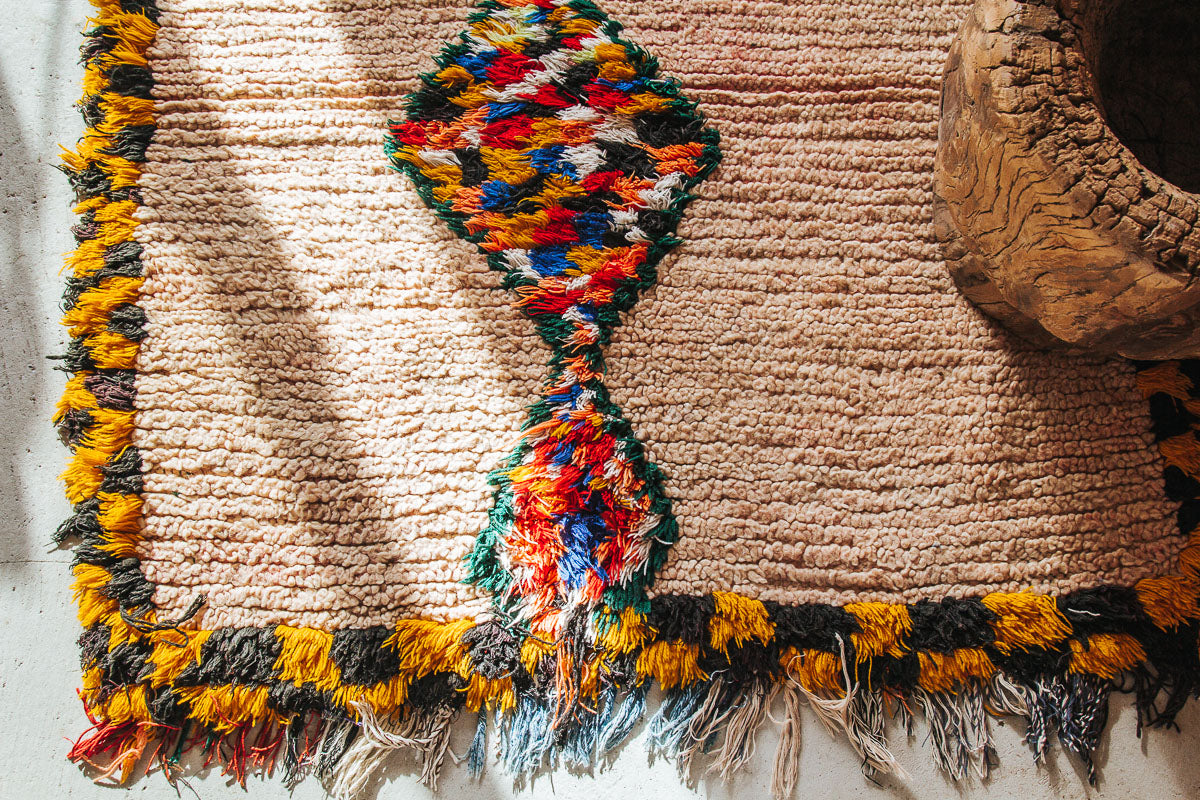 vintage boho wool woollen moroccan boujaad hallway runner rug in terracotta peach tones with yellow and black check border