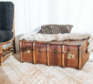 vintage boho retro antique canvas suitcase trunk with wooden runners and metal edges.  Cool industiral vibe.  Use it as as table or storage