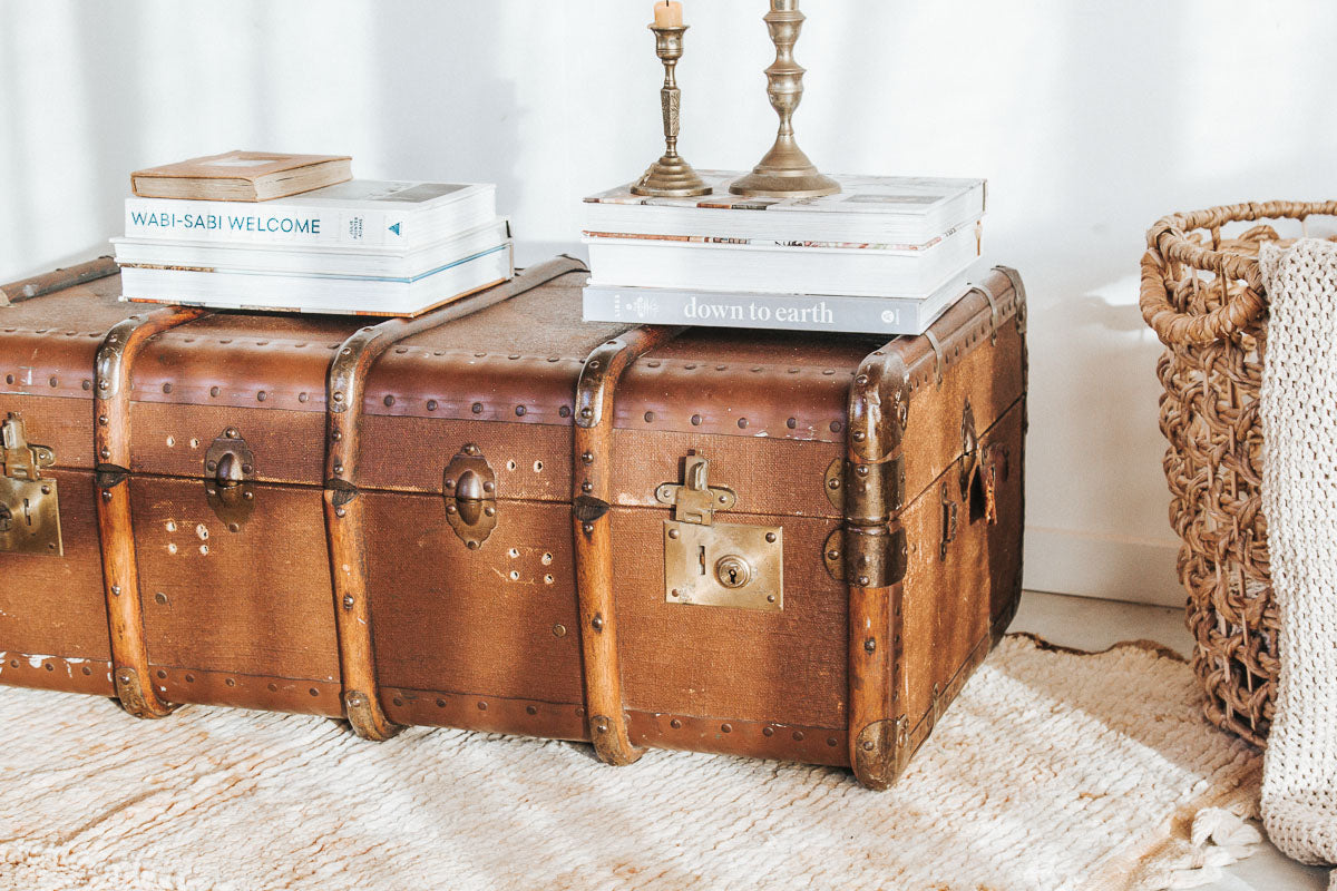 vintage boho retro antique canvas suitcase trunk with wooden runners and metal edges.  Cool industiral vibe.  Use it as as table or storage