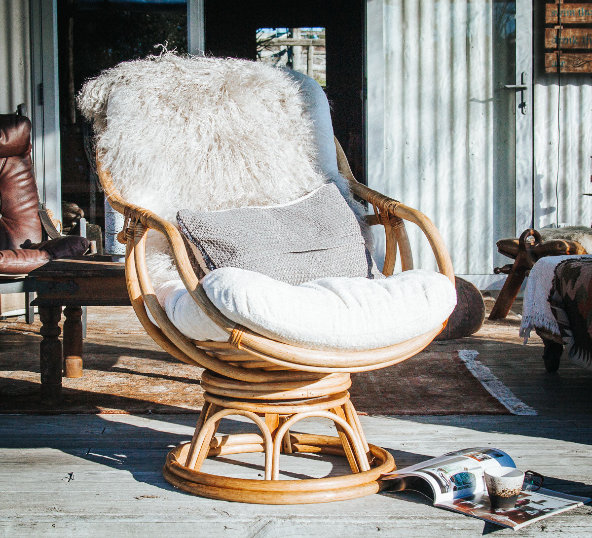 vintage cane rattan boho swivel armchair with upholstered velvet cushion