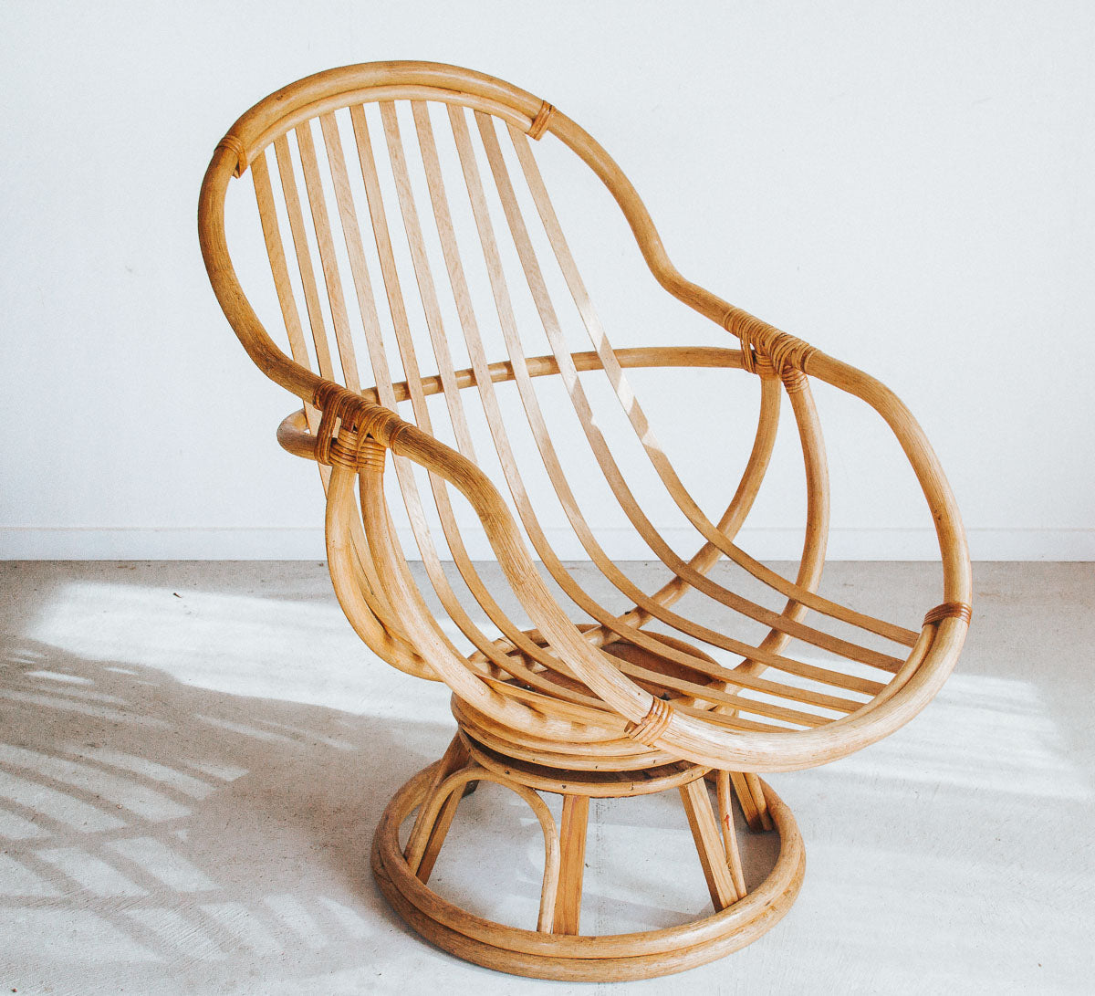 vintage cane rattan boho swivel armchair with upholstered velvet cushion