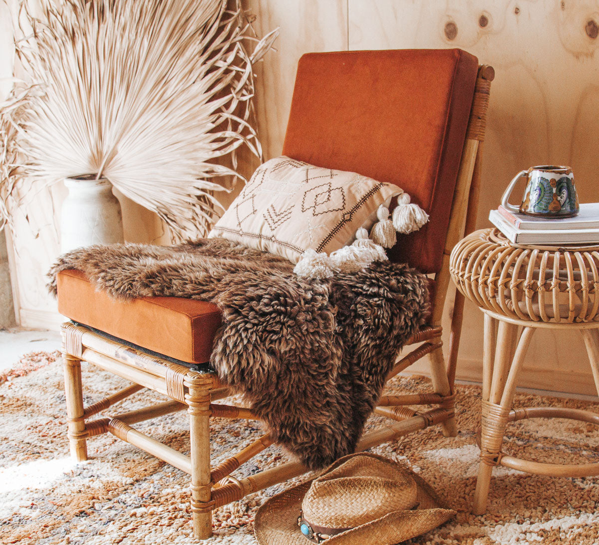 vintage boho cane rattan armchair covered in tangerine velvet fabric