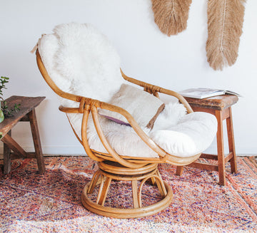 vintage cane rattan boho swivel armchair with upholstered velvet cushion
