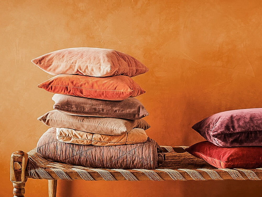 Beautiful cushions with an orange background
