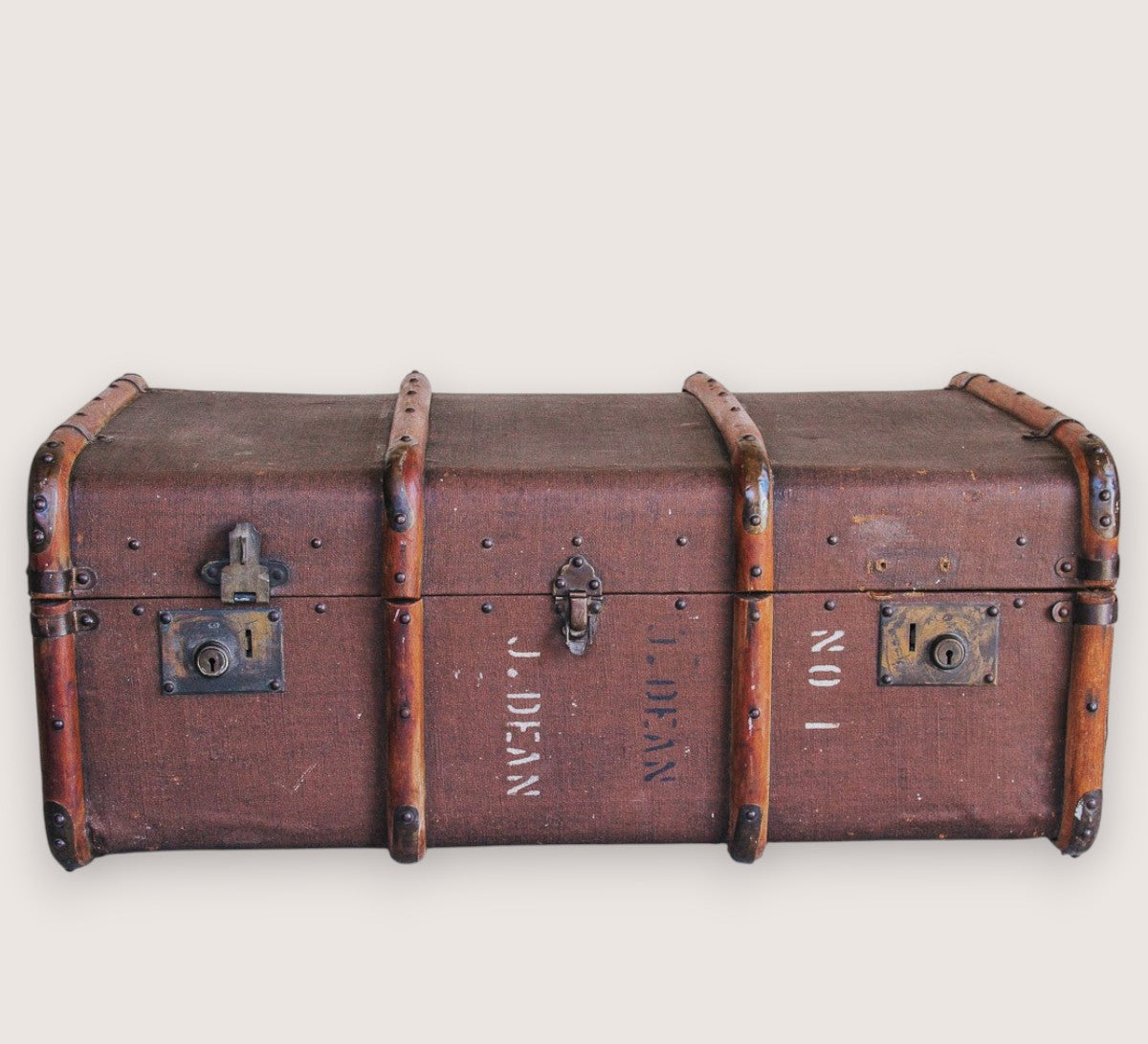 vintage boho antique canvas travel trunk with wooden runners and brass metal corners